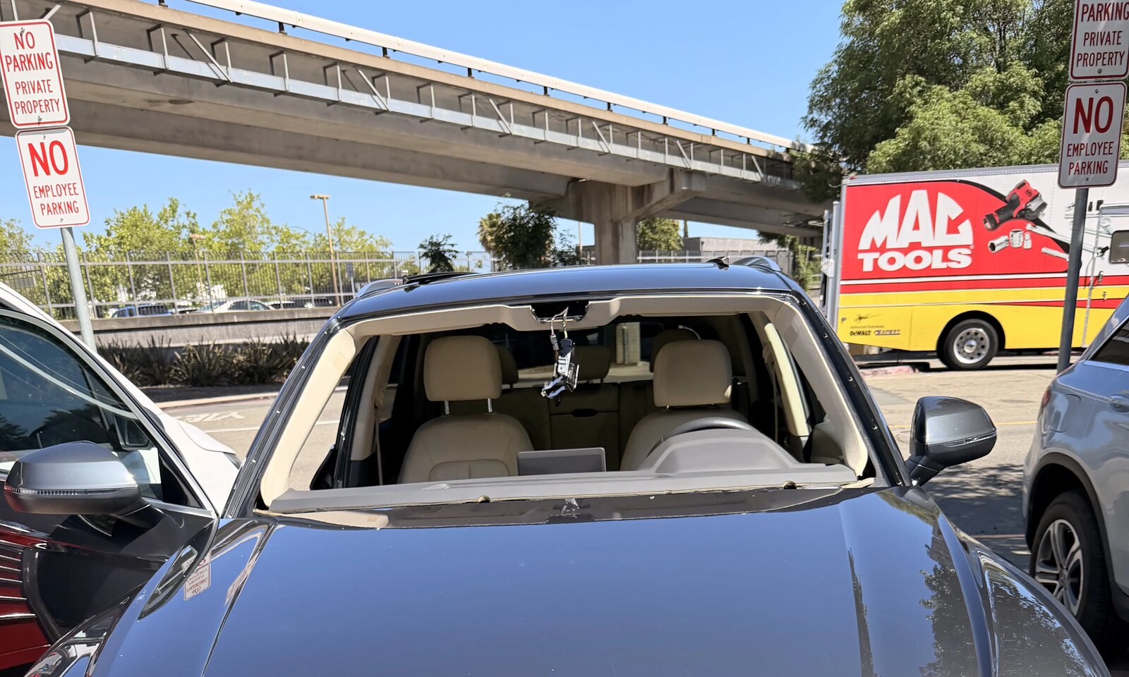 Audi SUV with the windshield removed, ready for a new OEM install.